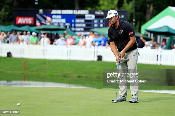 Ryan Moore putts on the 18th green during the final round of the John Deere Classic at TPC Deere Run on August 14, 2016 in Silvis, Illinois.