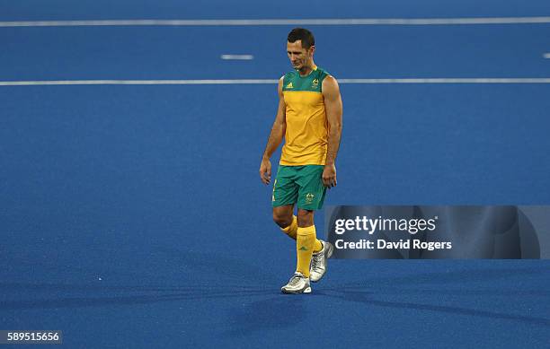 Jamie Dwyer of Australia looks dejected as he leaves the pitch after Australia's 4-0 defeat during the Men's hockey quarter final match between the...