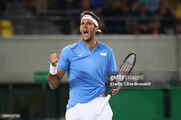 Juan Martin Del Potro of Argentina celebrates winning a point during the men's singles gold medal match against Andy Murray of Great Britain on Day 9...