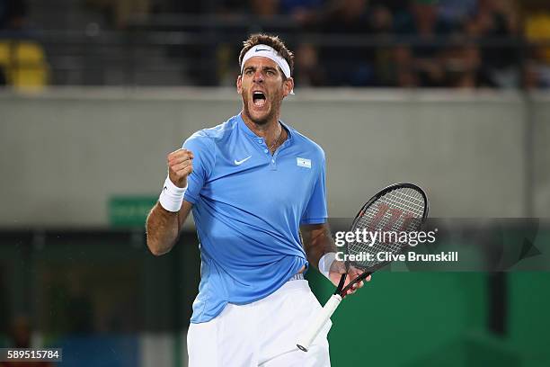 Juan Martin Del Potro of Argentina celebrates winning a point during the men's singles gold medal match against Andy Murray of Great Britain on Day 9...