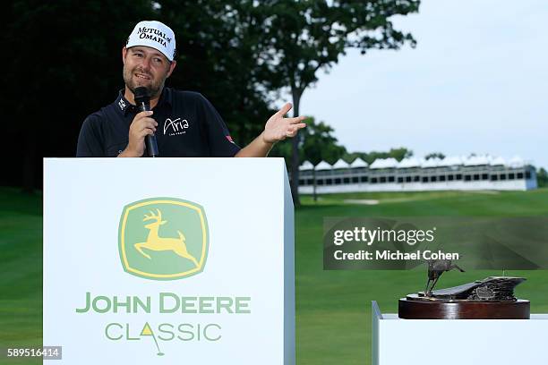 Ryan Moore speaks after winning the John Deere Classic during the final round of the John Deere Classic at TPC Deere Run on August 14, 2016 in...