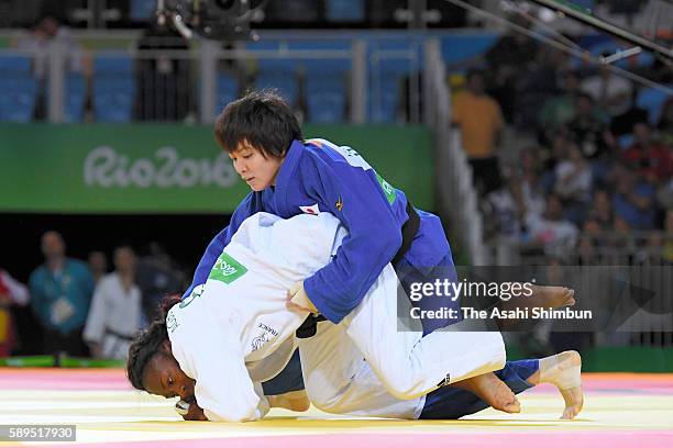 Miku Tashiro of Japan and Clarisse Agbegnenou of France compete in the Women's -63kg semifinal on Day 4 of the Rio 2016 Olympic Games at the Carioca...