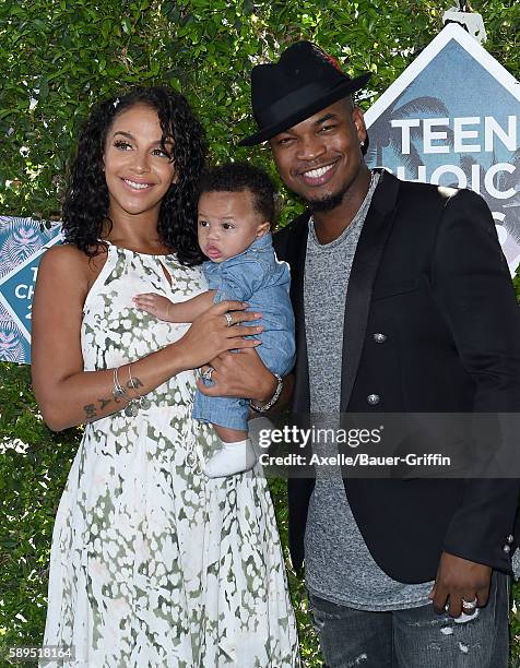Crystal Renay and recording artist Ne-Yo arrive at the Teen Choice Awards 2016 at The Forum on July 31, 2016 in Inglewood, California.