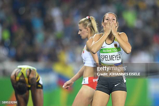Germany's Ruth Sophia Spelmeyer reacts in the Women's 400m Semifinal during the athletics event at the Rio 2016 Olympic Games at the Olympic Stadium...