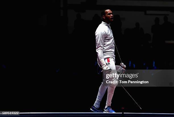 Yannick Borel of France reacts against Marco Fichera of Italy during the Men's Epee Team Gold Medal Match on Day 9 of the Rio 2016 Olympic Games at...