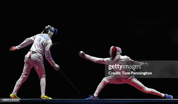 Enrico Garozzo of Italy competes against Daniel Jerent of France during the Men's Epee Team Gold Medal Match on Day 9 of the Rio 2016 Olympic Games...