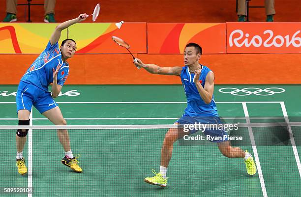 Yunlei Zhao and Nan Zhang of China in action during their Mixed Doubles Quarter Final match against Japan during on Day 9 of the Rio 2016 Olympic...