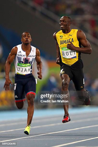 Chijindu Ujah of Great Britaina and Usain Bolt of Jamaica compete in the Men's 100 meter semifinal on Day 9 of the Rio 2016 Olympic Games at the...