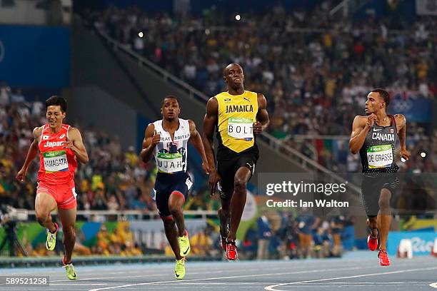 Usain Bolt of Jamaica wins the Mens 100m Semi Final ahead of Andre De Grasse of Canada, Chijindu Ujah of Great Britain and Ryota Yamagata of Japan on...