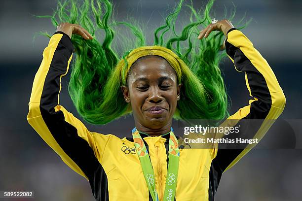 Shelly-Ann Fraser-Pryce of Jamaica poses with the bronze medal for the Women's 100 meters on Day 9 of the Rio 2016 Olympic Games at the Olympic...