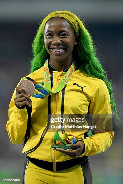 Shelly-Ann Fraser-Pryce of Jamaica poses with the bronze medal for the Women's 100 meters on Day 9 of the Rio 2016 Olympic Games at the Olympic...