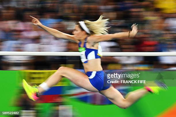 Greece's Paraskevi Papachristou competes in the Women's Triple Jump Final during the athletics event at the Rio 2016 Olympic Games at the Olympic...