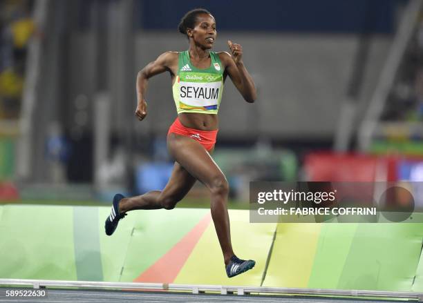 Ethiopia's Dawit Seyaum competes in the Women's 1500m Semifinal during the athletics event at the Rio 2016 Olympic Games at the Olympic Stadium in...