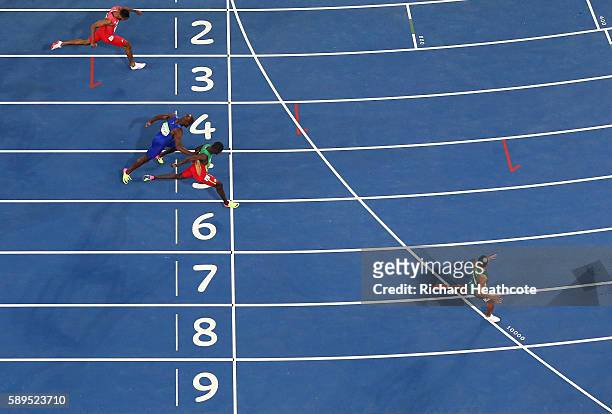 Wayde van Niekerk of South Africa wins the mens 400m Final ahead of Kirani James of Grenada and Lashawn Merritt of the United States on Day 9 of the...