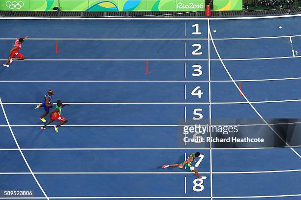 Wayde van Niekerk of South Africa wins the mens 400m Final ahead of Kirani James of Grenada and Lashawn Merritt of the United States on Day 9 of the...