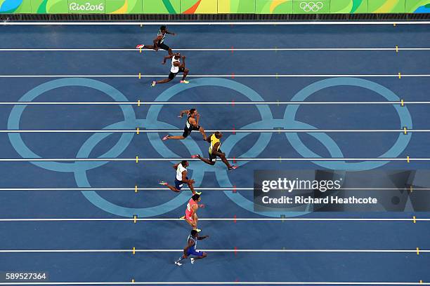 Tejhae Greene of Antigua and Barbuda, Kim Collins of Saint Kitts and Nevis, Andre De Grasse of Canada, Usain Bolt of Jamaica, Chijindu Ujah of Great...