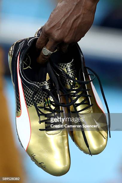Detail of the spikes of Usain Bolt of Jamaica as he celebrates winning the Men's 100 meter final on Day 9 of the Rio 2016 Olympic Games at the...
