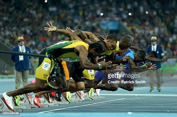 Usain Bolt of Jamaica and others take off from the starting block in the Men's 100 meter final on Day 9 of the Rio 2016 Olympic Games at the Olympic...
