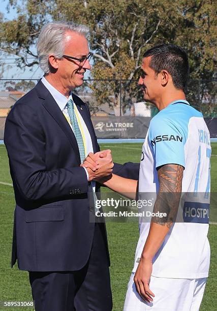 New signing Tim Cahill is greeted by FFA CEO David Gallop during a Melbourne City A-League press conference at La Trobe University Sports Fields on...