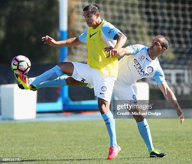 New signings Tim Cahill and Manny Muscat compete for the ball during a Melbourne City A-League press conference at La Trobe University Sports Fields...
