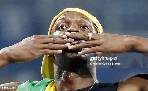 Jamaica's Usain Bolt blows a kiss to the crowd after winning the men's 100 meters at the Rio de Janeiro Olympics on Aug. 14, 2016. Bolt won in 9.81...