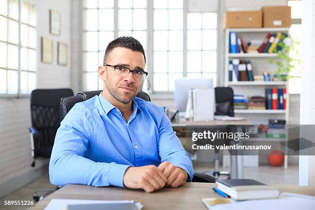 portrait of young businessman at workplace - basketball certificate stock pictures, royalty-free photos & images