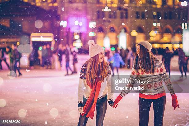 with bestie for christmas - woman snow outside night stock pictures, royalty-free photos & images