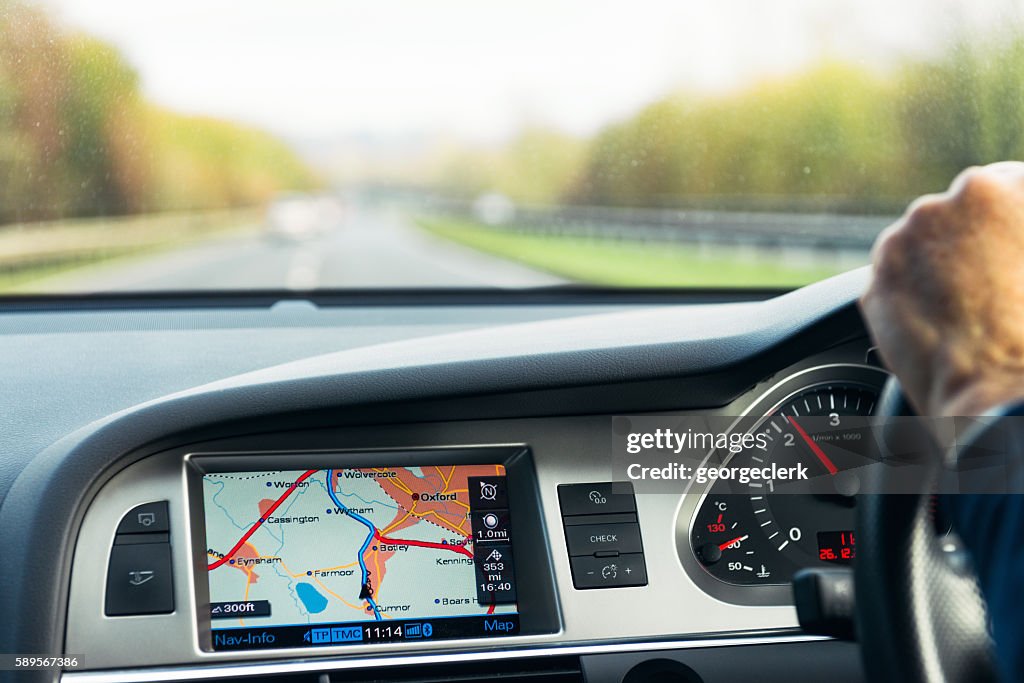 Built-in Audi satellite navigation in use on UK road