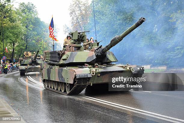 american tanks driving on the street - armoured vehicle stock pictures, royalty-free photos & images
