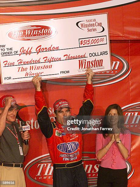 Jeff Gordon celebrates winning The Winston at Lowe's Motorspeedway in Concord, North Carolina.. DIGITAL IMAGE Mandatory Credit: Jonathan...