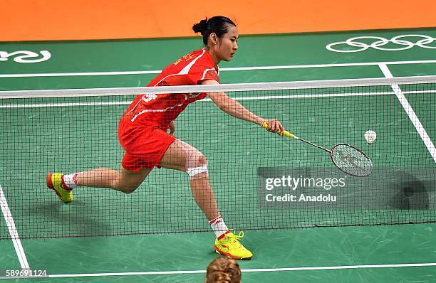 Wang Yihan of China competes against Schnaase Karin of Germany during the Women's Singles Group P Badminton match on Day 9 of the 2016 Rio Olympics...