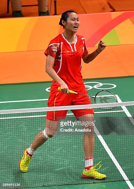 Wang Yihan of China competes against Schnaase Karin of Germany during the Women's Singles Group P Badminton match on Day 9 of the 2016 Rio Olympics...
