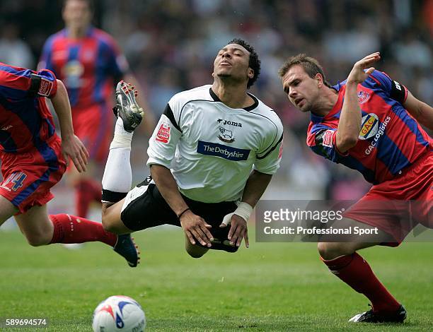 Gils Barnes of Derby County goes airborne after a tackle from Carl Fletcher of Crystal Palace during the Coca Cola Championship match between Crystal...