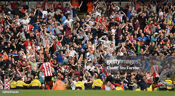 Sunderland fans celebrate Jermain Defoe goal during the Premier League match between Manchester City and Sunderland at Etihad Stadium on August 13,...