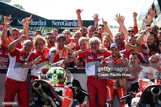 Andrea Iannone and Andrea Dovizioso wit team celebrate the first and second place at Austrian motogp. The result turn out that Andrea Iannone takes...