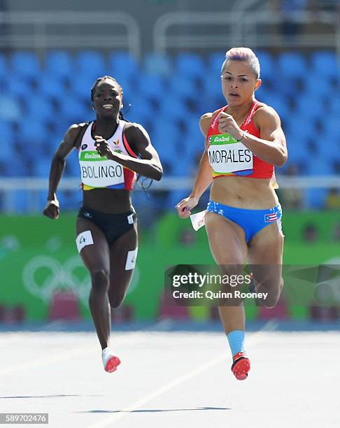 Celiangeli Morales of Puerto Rico and Cynthia Bolingo of Belgium compete in round one of the Women's 200m on Day 10 of the Rio 2016 Olympic Games at...