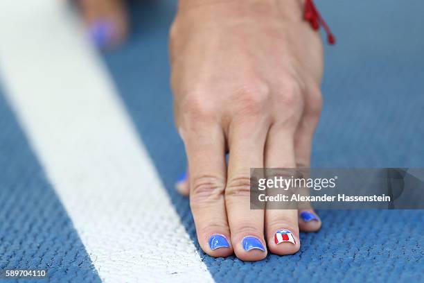 Detail of the hand of Celiangeli Morales of Puerto Rico as she competes in round one of the Women's 200m on Day 10 of the Rio 2016 Olympic Games at...