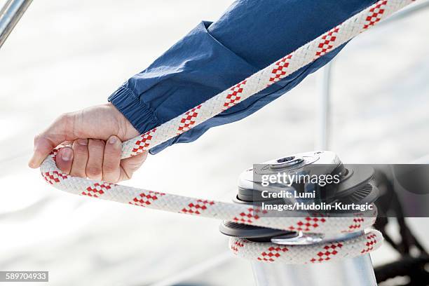 Adjusting Adjusting Sail Photos and Premium High Res Pictures - Getty Images