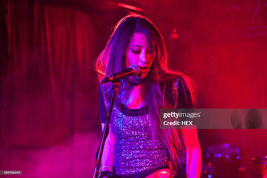 Young woman performing at a club