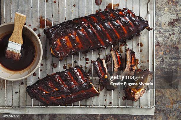 pomegranate and red wine glazed pork ribs - barbecue pork stock pictures, royalty-free photos & images