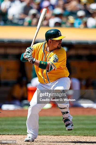 Billy Butler of the Oakland Athletics at bat against the Baltimore Orioles during the seventh inning at the Oakland Coliseum on August 11, 2016 in...