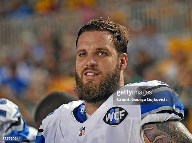 Offensive tackle Taylor Decker of the Detroit Lions looks on from the sideline during a National Football League preseason game against the...