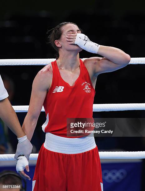 Rio , Brazil - 15 August 2016; Katie Taylor of Ireland reacts after her defeat to Mira Potkonen of Finland in their Lightweight quarter-final bout in...