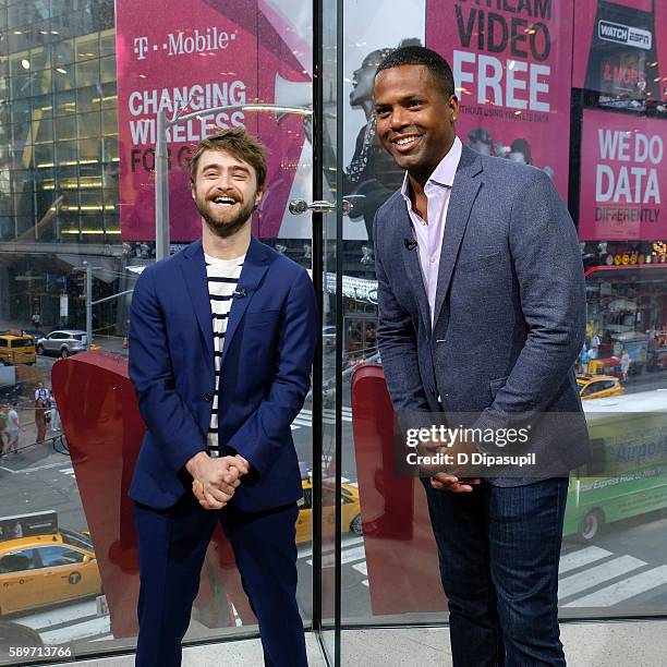 Calloway interviews Daniel Radcliffe during his visit to "Extra" at their New York studios at H&M in Times Square on August 15, 2016 in New York City.