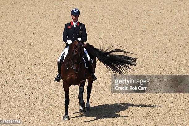 Carl Hester of Great Britain riding Nip Tuck competes in the Dressage Individual Grand Prix Freestyle on Day 10 of the Rio 2016 Olympic Games at...