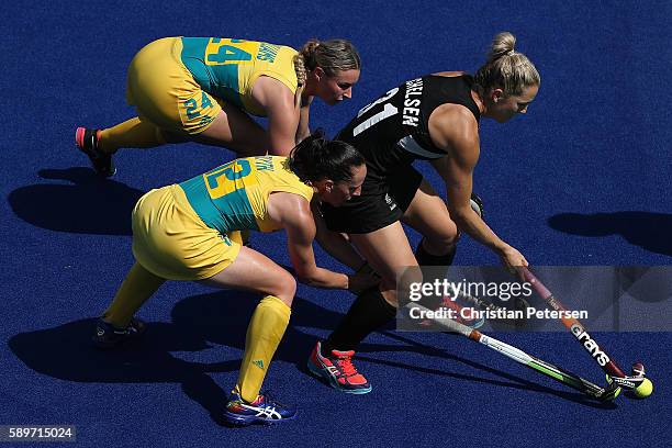 Stacey Michelsen of New Zealand attempts to control the ball pressured by Mariah Williams and Madonna Blyth of Australia during the second half of...