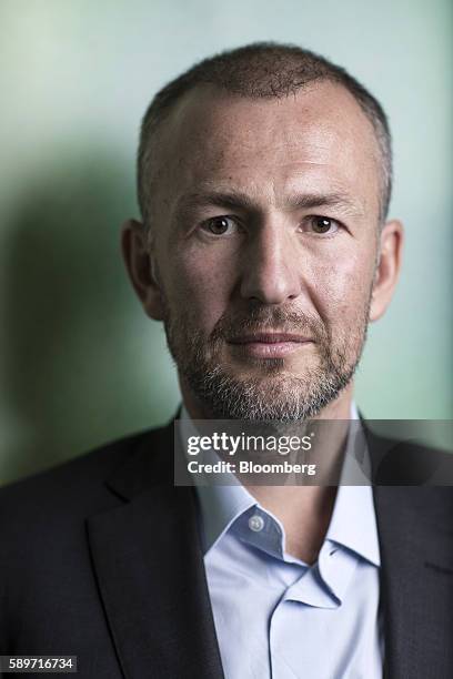 Billionaire Andrey Melnichenko, owner of EuroChem Group AG, poses for a photograph in London, U.K., on Monday, Aug. 15, 2016. EuroChem Group AGs new...