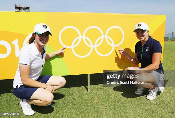 Leona Maguire and Stephanie Meadow of Ireland pose together during a practice round prior to the start of the women's golf during Day 10 of the Rio...