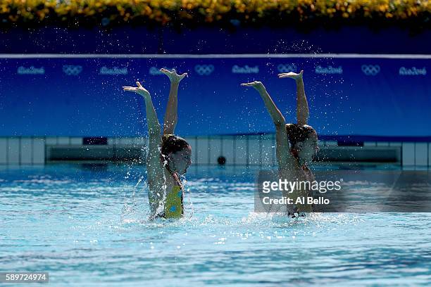 Katie Clark and Olivia Federici of Great Britain compete in the Women's Duets Synchronised Swimming Technical Routine Preliminary Round on Day 10 of...
