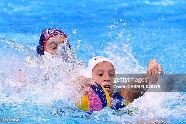 Aria Fischer vies with Brazil's Izabella Chiappini during their Rio 2016 Olympic Games waterpolo quaterfinal match at the Olympic Aquatics Stadium in...